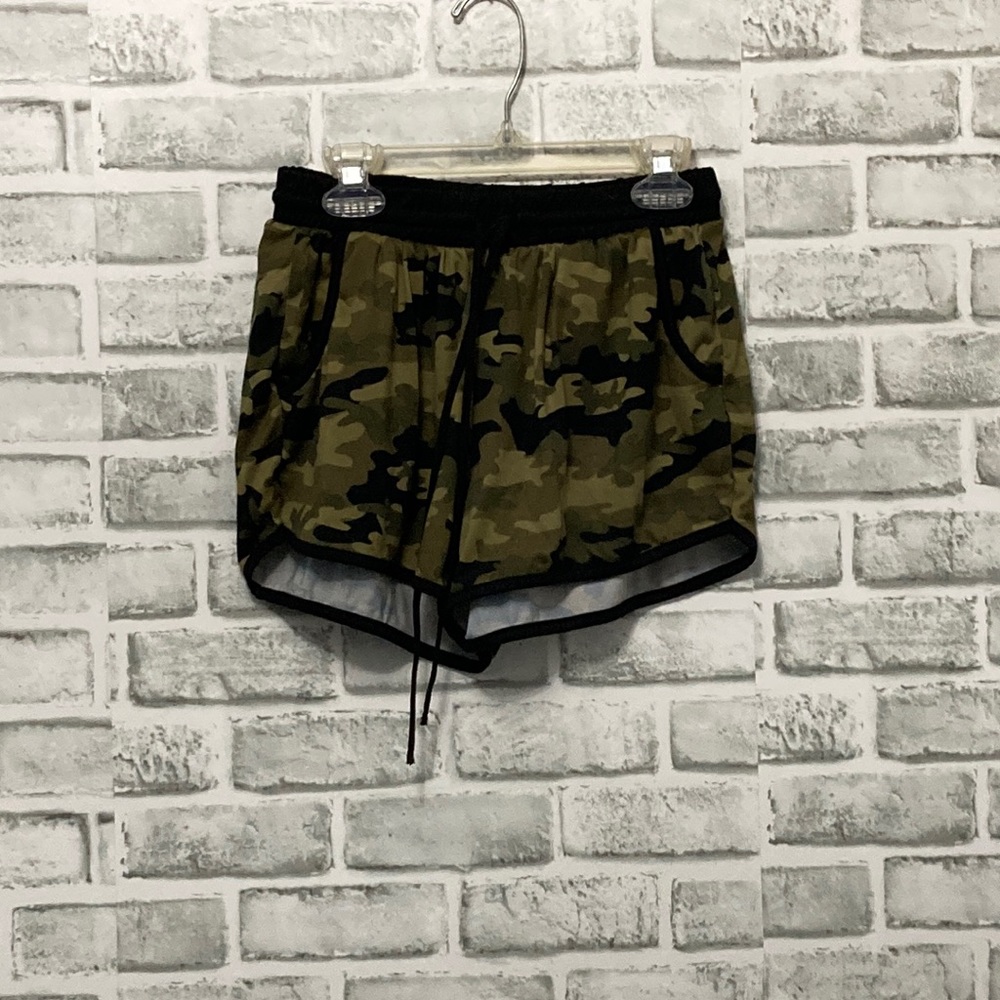 Stretchy army green shorts with string at front to make tighter.